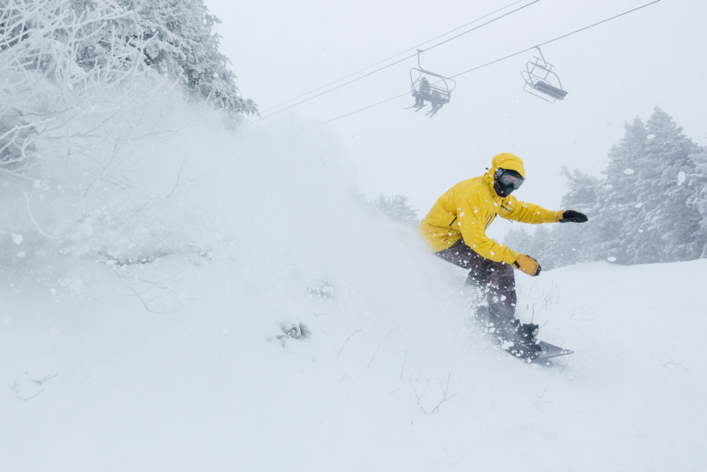 Nathanael Asaro Slashing Pow at Bolton Valley Christmas Weekend 2020. Photo by Hannah Beach