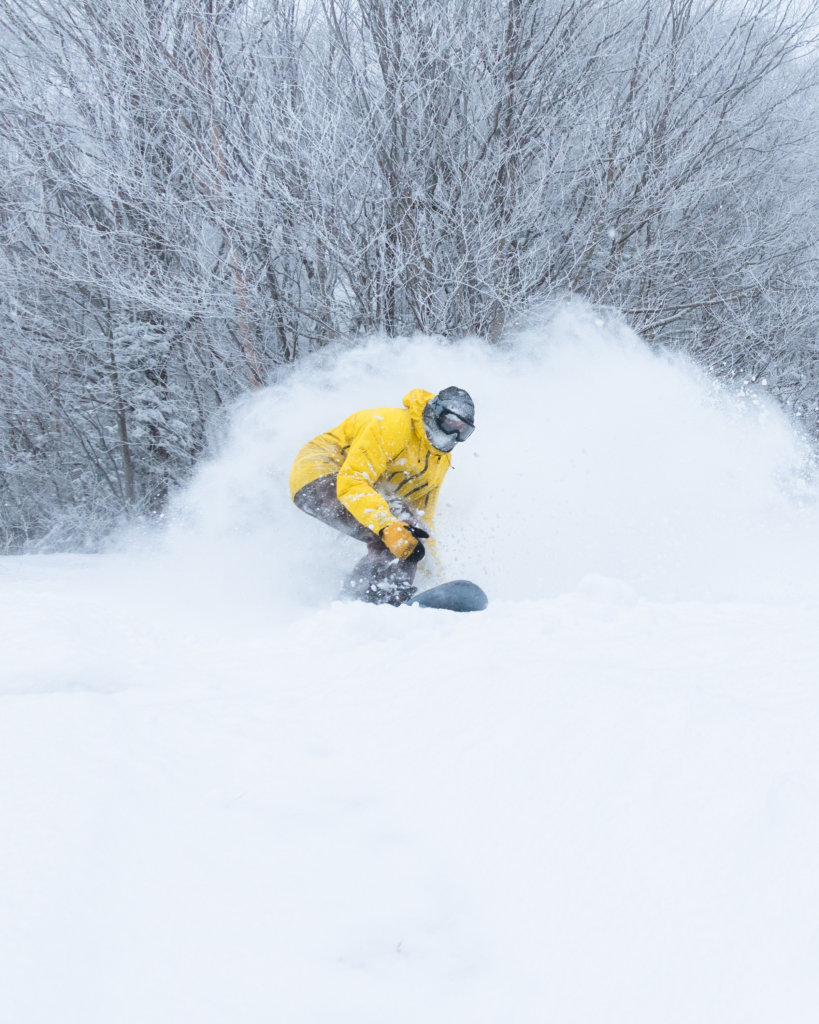 Nathanael Asaro Slashing Pow at Bolton Valley Christmas Weekend 2020. Photo by Hannah Beach