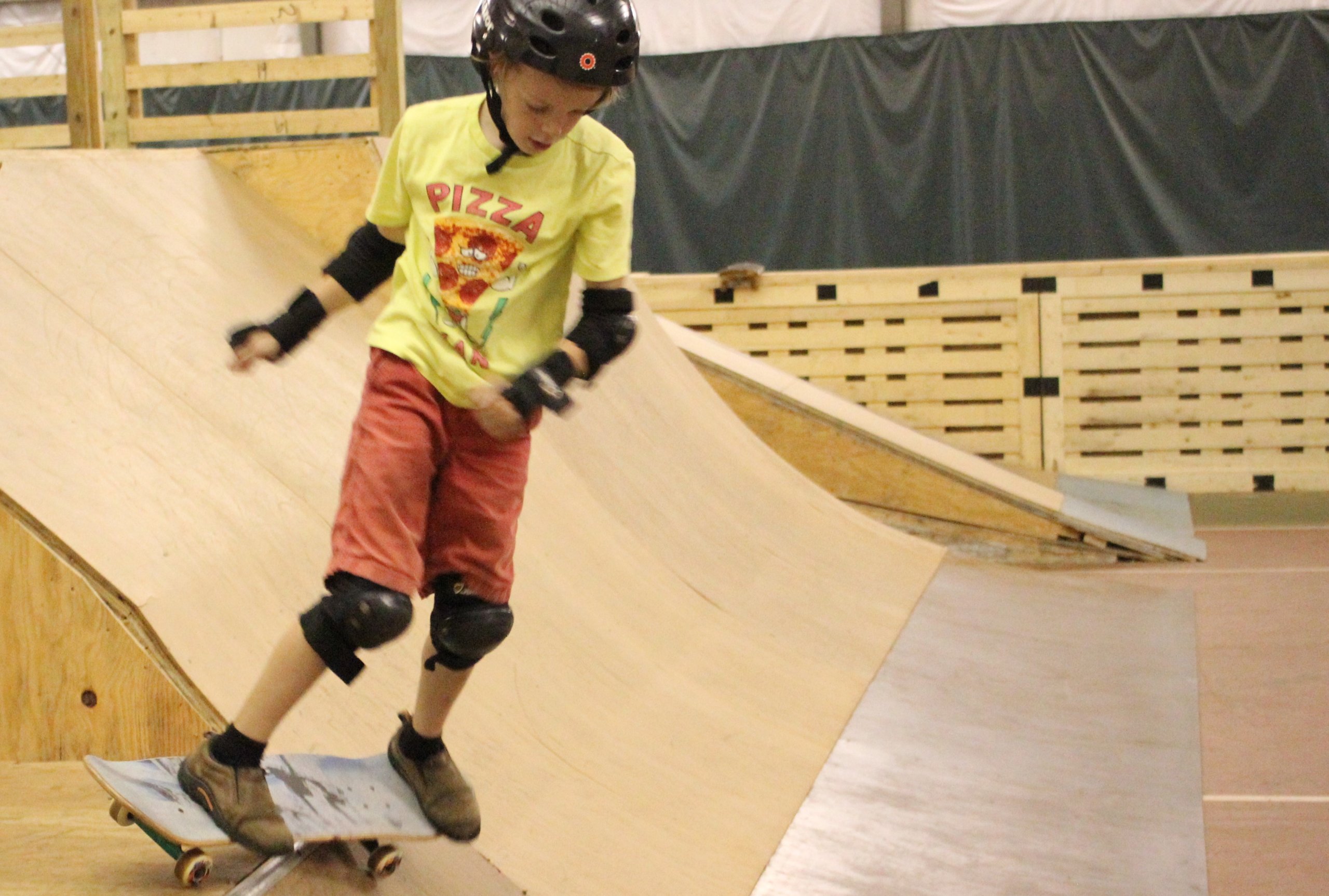 A Kid Skates the Ramp at Bolton Valley's Skate Park