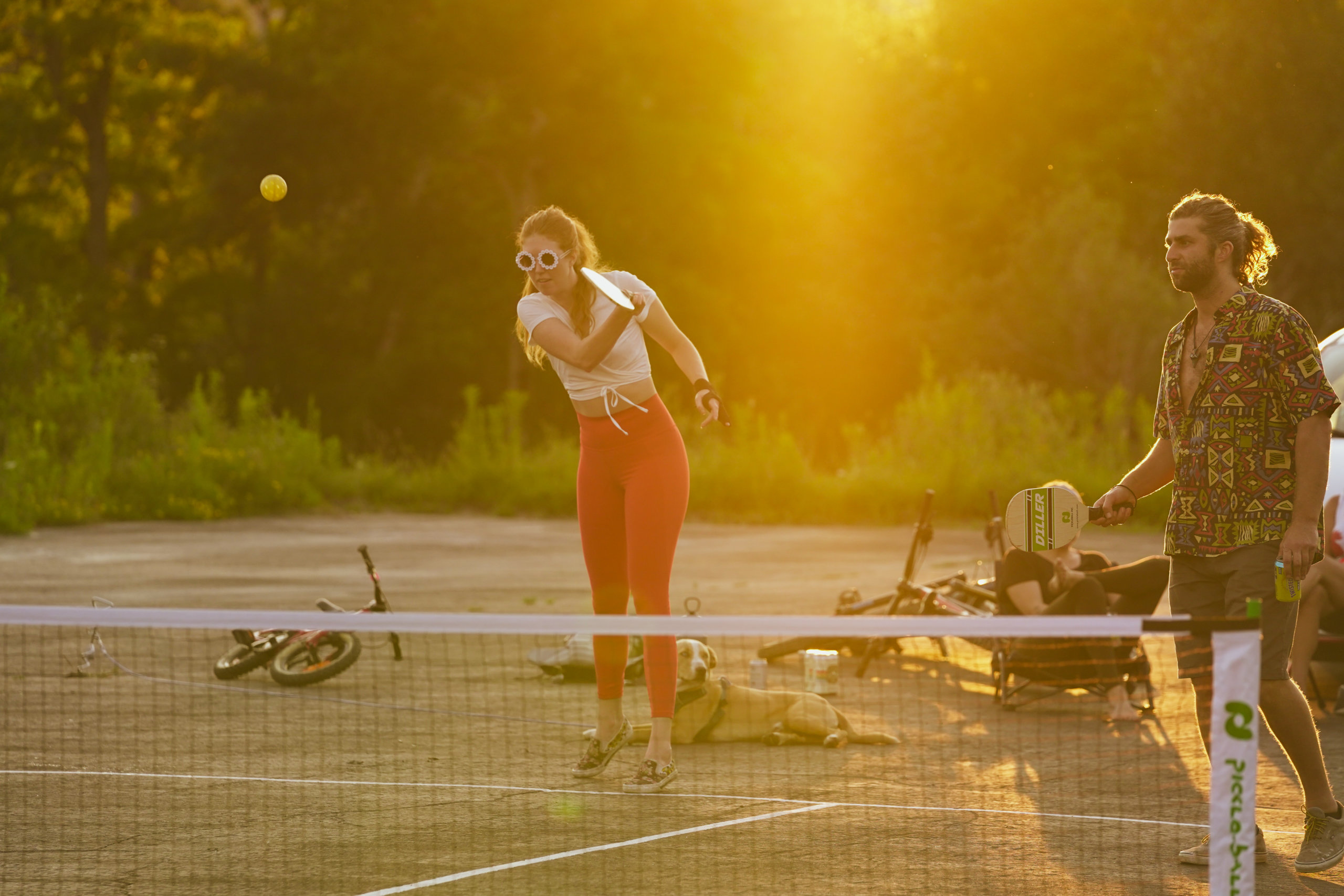 A Woman Returns a Shot on the Pickleball Court