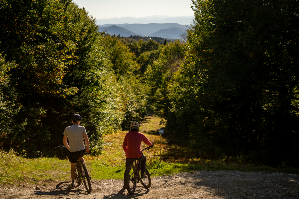 Mountain Bikers Enjoy The View During Fall