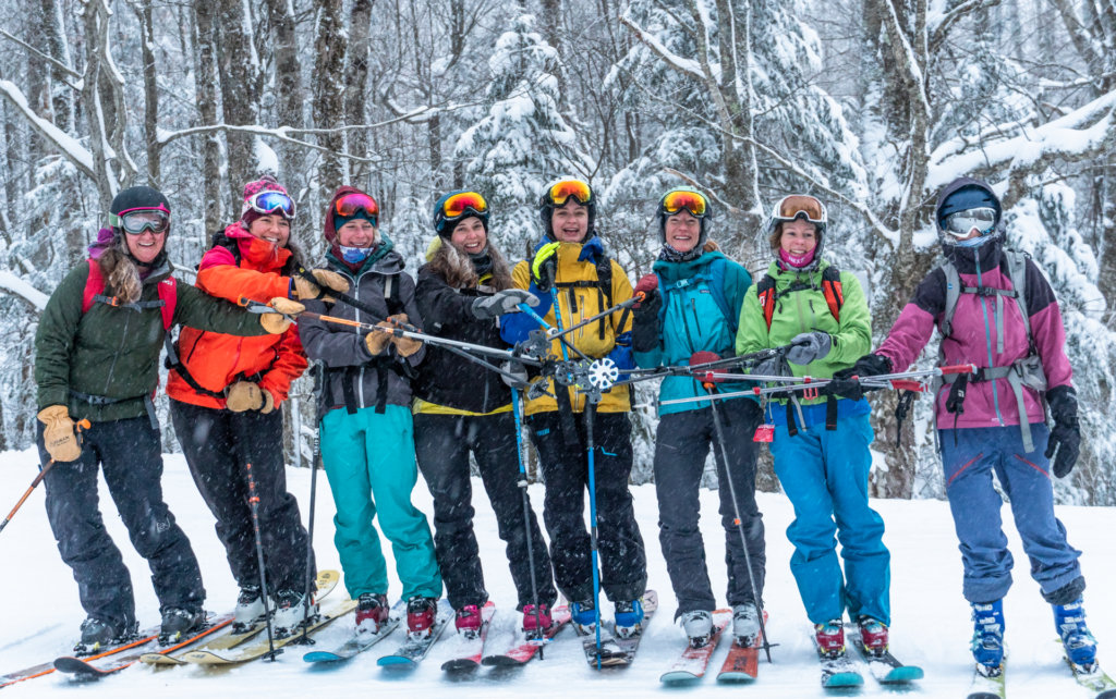 A Group of Women Skiers on Snow