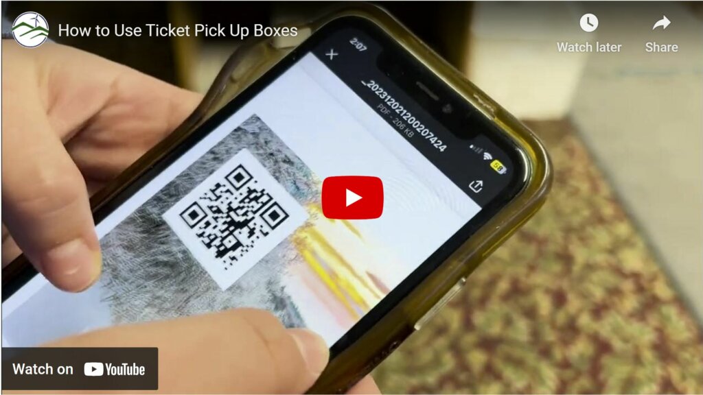 QR code in the ticket confirmation email being displayed on a smartphone